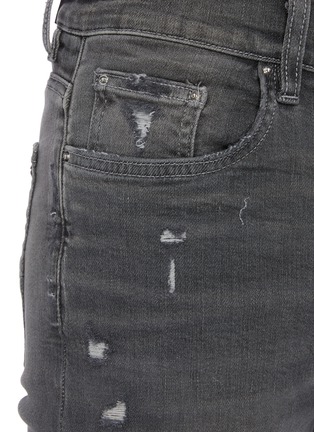  - AMIRI - MX1' suede patch distressed skinny jeans