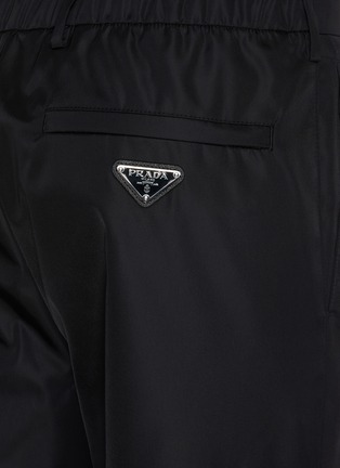PRADA | Back Logo Patch Cuffed Leg Nylon Pants | Men | Lane Crawford