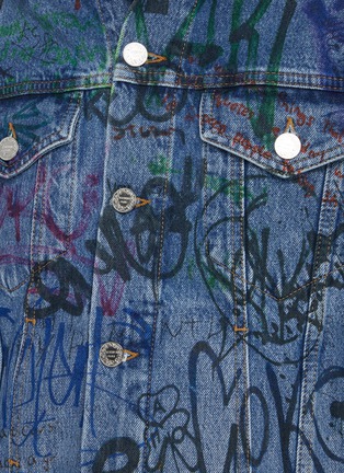  - VETEMENTS - All-over graffiti print denim jacket