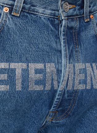  - VETEMENTS - Crystal logo embellished straight cut jeans