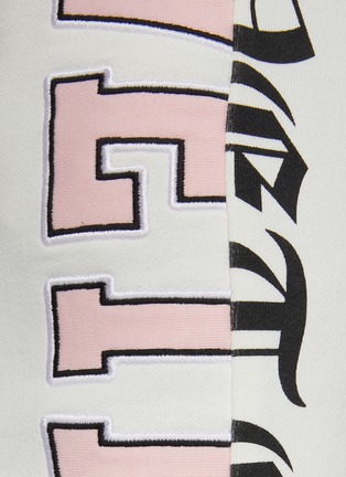  - VETEMENTS - Contrast Spliced Logo Print Sweatpants