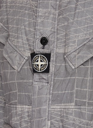  - STONE ISLAND - Reflective grid pattern garment dyed Lamy-TC parka jacket