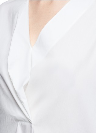 Detail View - Click To Enlarge - NOHKE - Cutout knotted back tie cuff shirt
