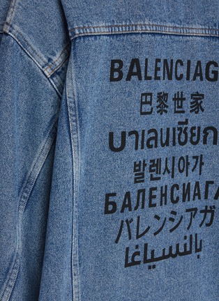  - BALENCIAGA - Multilingual Print Stonewash Denim Jacket