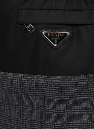  - PRADA - LOGO PLAQUE ZIPPED PANTS