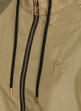  - P.E NATION - 'Triple Double' dual layer logo back spray jacket