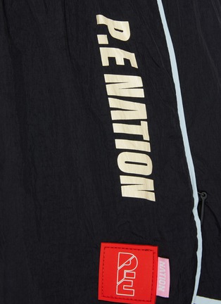  - P.E NATION - 'Align' double waist band logo shorts
