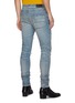 Back View - Click To Enlarge - AMIRI - Logo Appliqued Ripped Slim Fit Light Wash Jeans