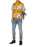 Figure View - Click To Enlarge - AMIRI - Logo Appliqued Ripped Slim Fit Light Wash Jeans