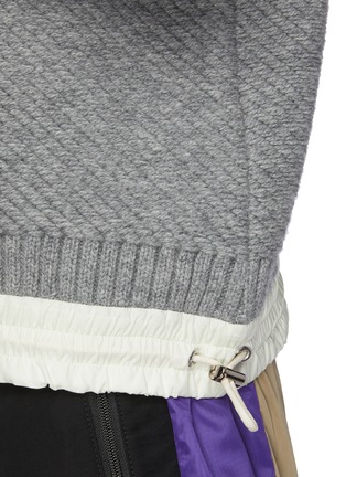  - SACAI - Multidirectional rib knit drawstring hem sweater