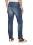 Back View - Click To Enlarge - FDMTL - Ripped And Repaired Slim Fit Washed Jeans