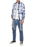 Figure View - Click To Enlarge - FDMTL - Multi Coloured Raw Edged Patchwork Slim Fit Washed Jeans