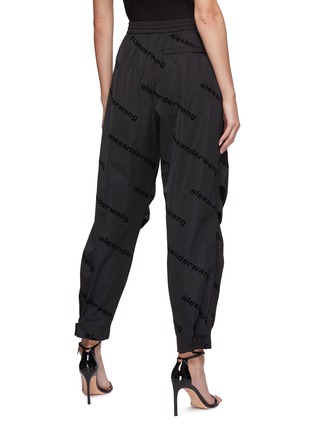 Back View - Click To Enlarge - ALEXANDER WANG - UNISEX ALL-OVER FLOCKED LOGO TAFFETA TRACK PANTS