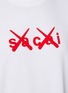  - SACAI - x KAWS Flock Logo T-shirt