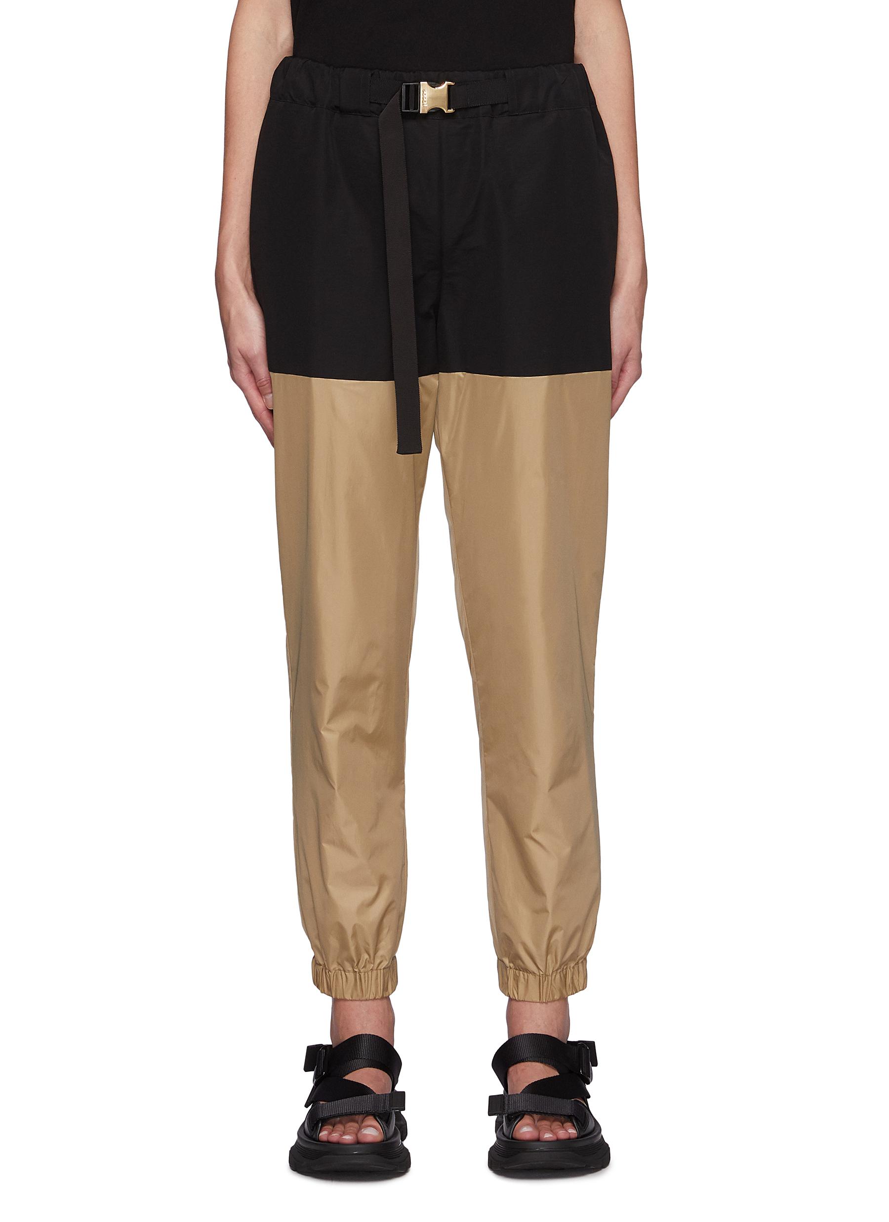 SACAI BELTED CONTRASTING COTTON TWILL PANELLED NYLON JOGGER PANTS