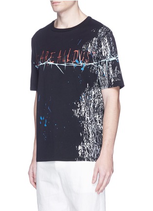 Front View - Click To Enlarge - HAIDER ACKERMANN - Slogan foil print T-shirt