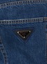  - PRADA - Metallic logo tab denim jeans