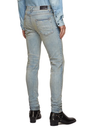 Back View - Click To Enlarge - AMIRI - STACK LIGHT WASHED WHISKERING SKINNY JEANS