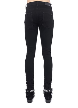 Back View - Click To Enlarge - AMIRI - ‘STACK’ UNWASHED SKINNY JEANS