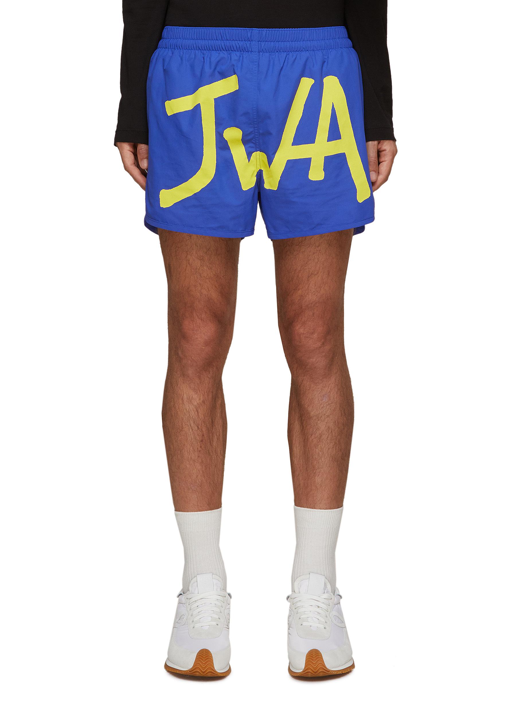 JW ANDERSON | JWA Contrasting Logo Swim Shorts | Men | Lane Crawford