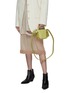 Front View - Click To Enlarge - ACNE STUDIOS - Top Handle Side Knot Micro Leather Bag