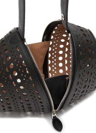 Detail View - Click To Enlarge - ALAÏA - ‘Shape' lace cutout leather wristlet bag