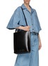 Front View - Click To Enlarge - GANNI - Logo debossed leather north south tote