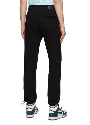 Back View - Click To Enlarge - AMIRI - FLOWER LOGO EMBROIDERED ELASTICATED WAIST TOGGLE CUFF SWEATPANTS