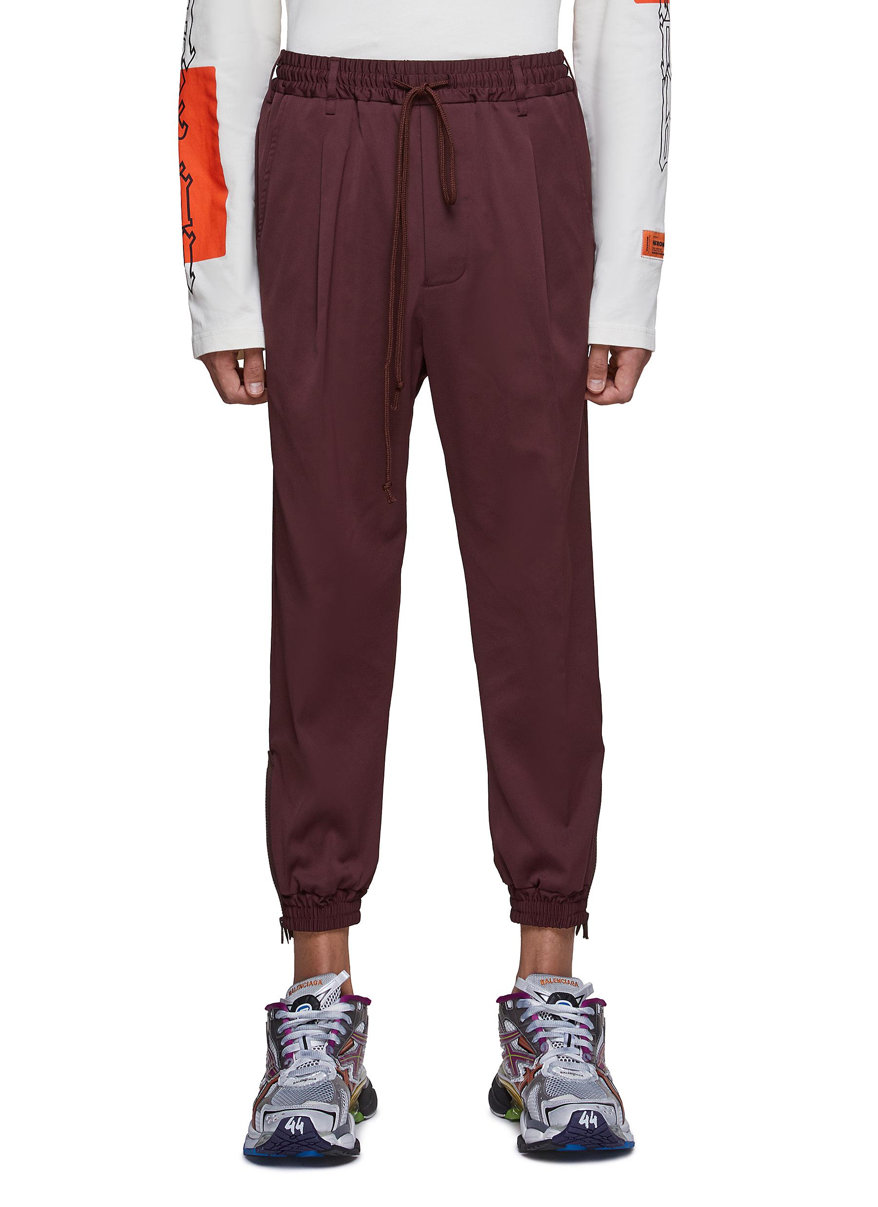 SONG FOR THE MUTE ‘GOLAY' ZIPPED CUFFS SATIN TRACK PANTS
