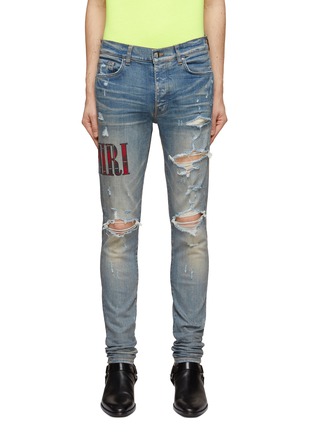 Main View - Click To Enlarge - AMIRI - LIGHT WASH DISTRESSED FLANNEL CORE SIDE LOGO KNEE SLITS SKINNY JEANS