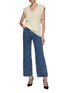Figure View - Click To Enlarge - KIMHĒKIM - ‘HELON’ ALL OVER LOGO PRINT WIDE LEG JEANS