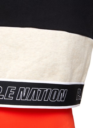  - P.E NATION - ‘FOREFRONT’ FRONT ZIP HOODED CROPPED JACKET