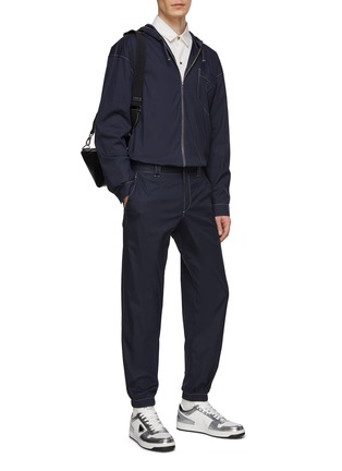 Figure View - Click To Enlarge - PRADA - Logo Patch Flat Front Contrast Stitch Elasticated Cuff Jogger Pants