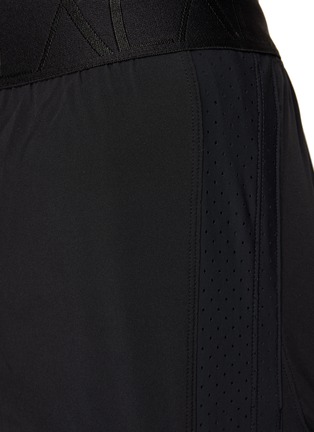  - ALALA - Perforated Stripe Layered Court Shorts