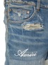  - AMIRI - Distressed Patchwork Skinny Jeans