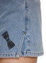  - MO&CO. - Bow Print Denim Mini Skirt