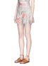 Front View - Click To Enlarge - ZIMMERMANN - 'Mercer Flutter Frill' floral print cotton-linen shorts