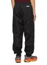 Back View - Click To Enlarge - MONCLER - x adidas Originals Allover Logo Jacquard Trackpants