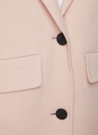 The sales loom coat