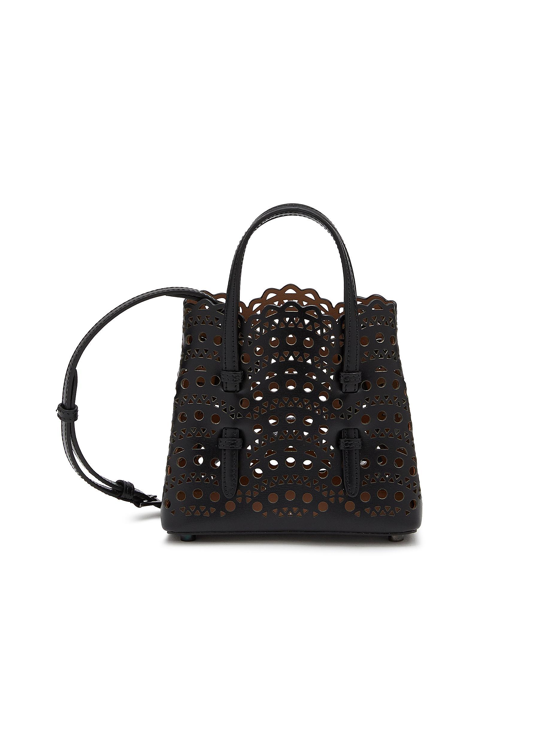 Mina Small Perforated Leather Tote Bag in Black - Alaia | Mytheresa
