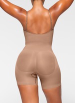 Skims Seamless Sculpt Mid-thigh Bodysuit in Brown