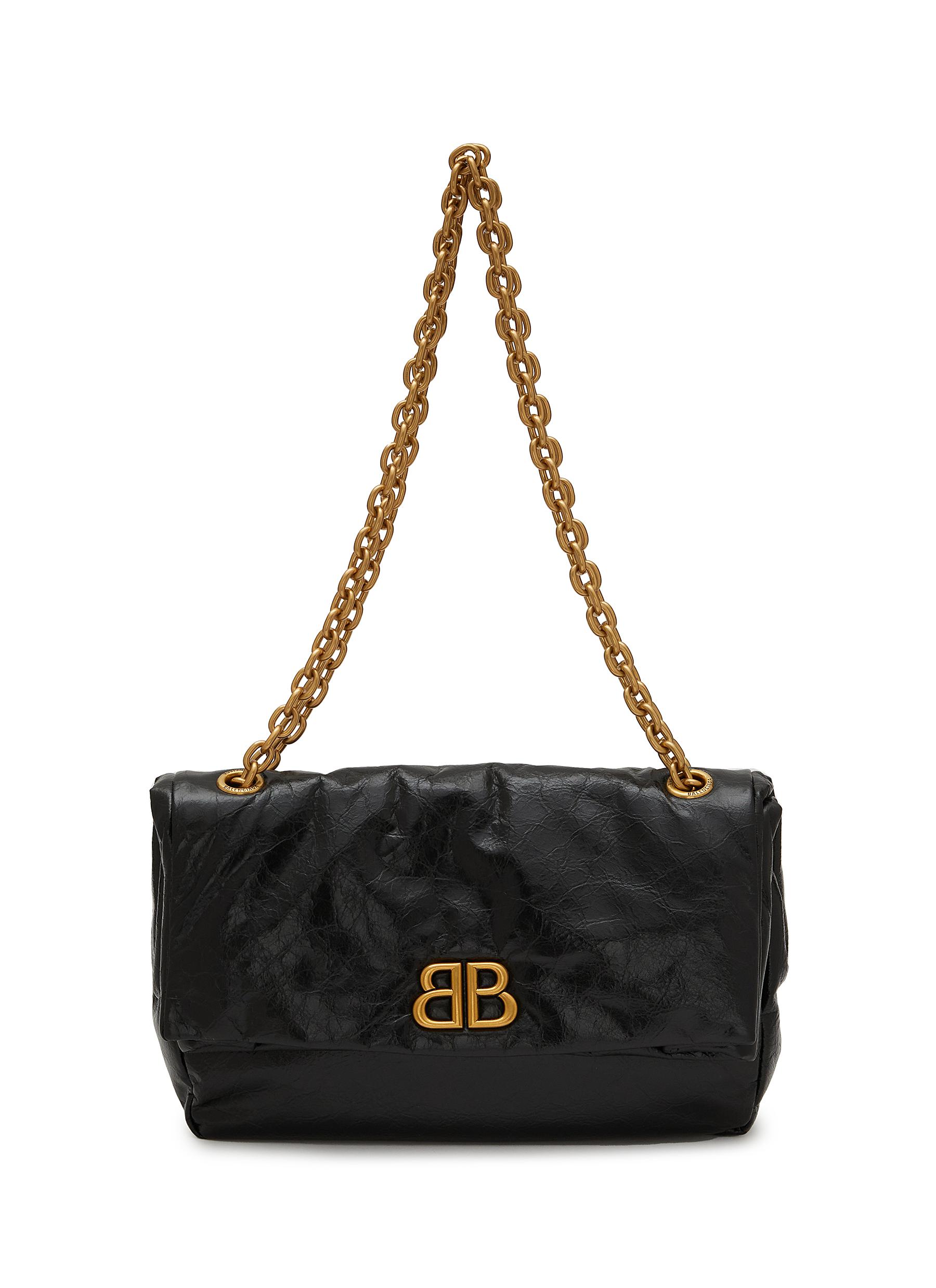 Balenciaga: Beige XS Hourglass Top Handle Bag | SSENSE Canada