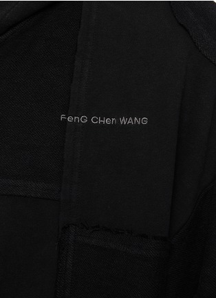  - FENG CHEN WANG - Panelled Stud Embellished Cotton Hoodie