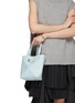Front View - Click To Enlarge - LOEWE - x Suna Fujita Mini Penguin Puzzle Fold Leather Tote Bag