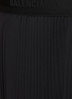 BALENCIAGA | Elasticated Logo Waist Pleated Skirt | Women