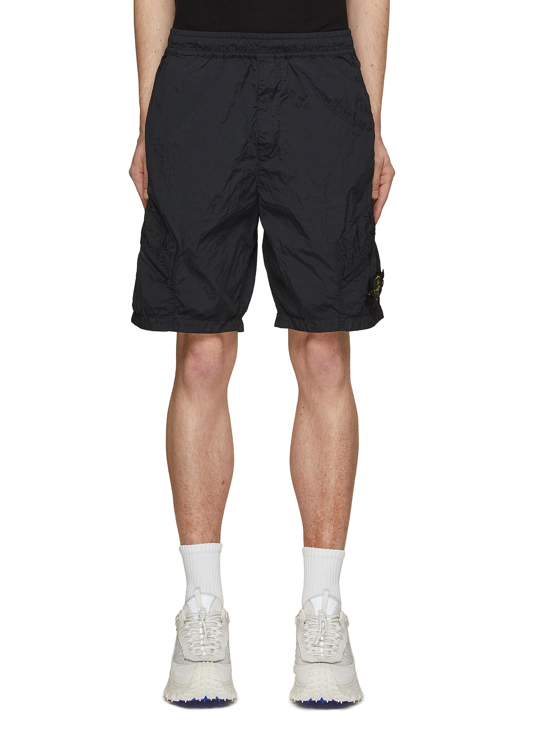 Stone island hot sale badge shorts