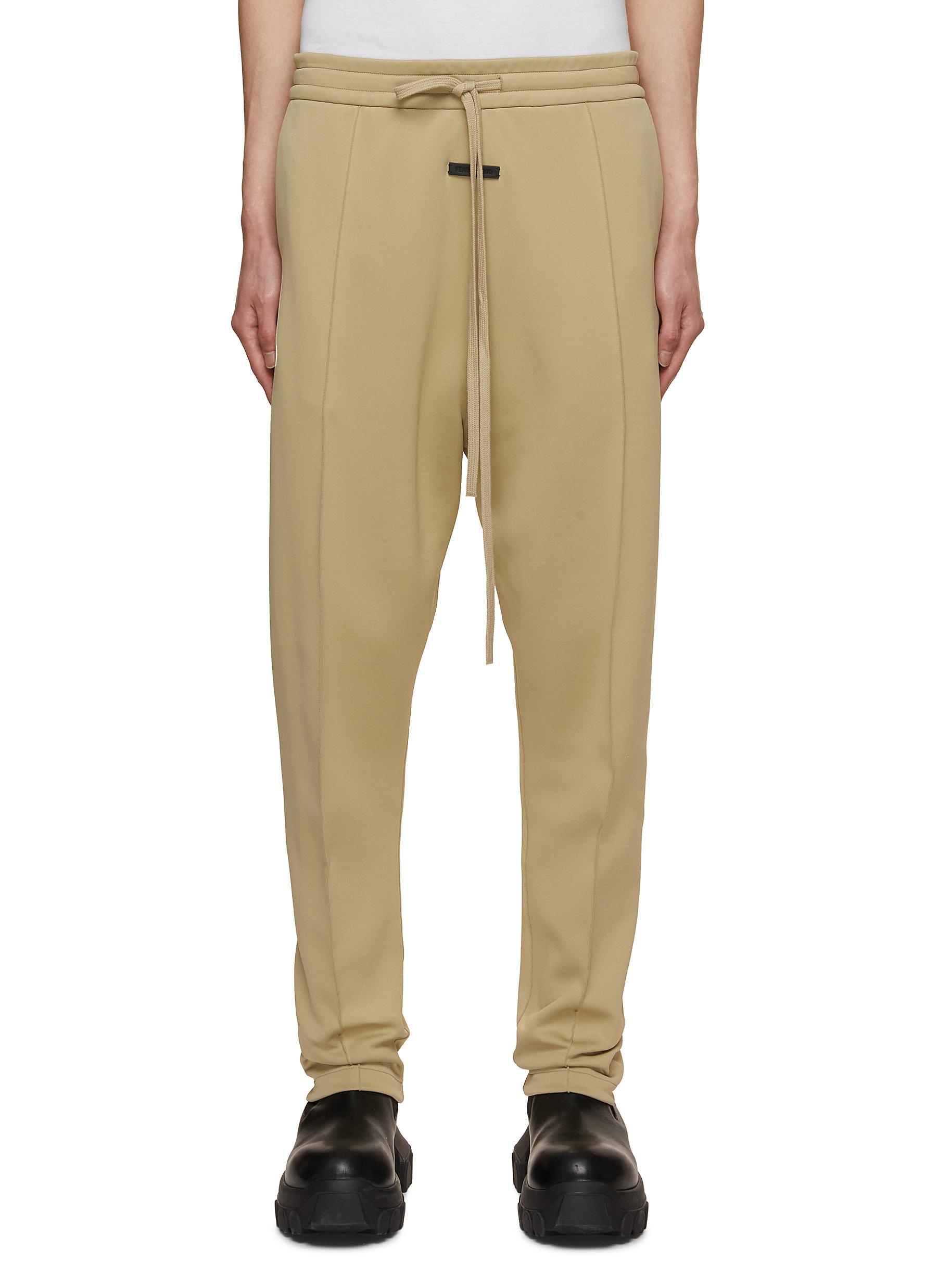Pleated And Tapered Drawstring Track Pants