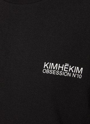  - KIMHĒKIM - Logo Slogan Cotton T-Shirt