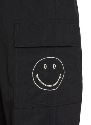  - JOSHUA SANDERS - Smiley Face Motif Cargo Pants