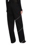 Back View - Click To Enlarge - ALAÏA - Spiral Zip Wide Leg Dark Wash Jeans